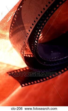 Unrolled 35mm Film on Desk View Large Photo Image Stock Photograph - Unrolled 35mm Film on Desk. Fotosearch