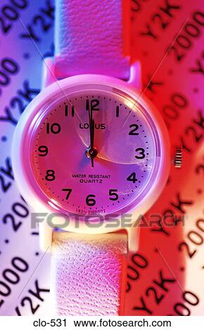 Stock Image - Watch with 2000 and Y2K in Background. Fotosearch