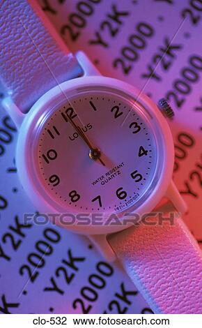 Stock Image - Watch with 2000 and Y2K in Background. Fotosearch