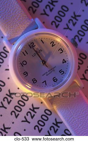 Stock Image - Watch with 2000 and Y2K in Background. Fotosearch