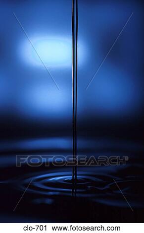 Water Pouring against Blue Background View Large Photo Image Stock Image - Water Pouring against Blue Background. Fotosearch