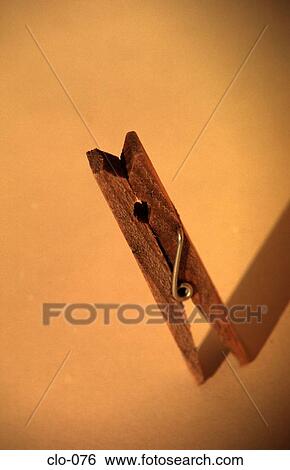 Wooden Clothes Peg on a Yellow Background View Large Photo Image Stock Photograph - Wooden Clothes Peg on a Yellow Background. Fotosearch