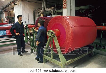 Workers by Large Bolt of Red Cotton Cloth Italy View Large Photo Image Stock Photograph - Workers by Large Bolt of Red Cotton Cloth Italy. Fotosearch