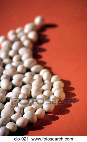 Yoghurt Covered Almonds against an Orange Background View Large Photo Image Stock Image - Yoghurt Covered Almonds against an Orange Background. Fotosearch
