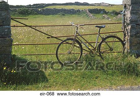 Bicycle Leaning on Rusting Five Bar Gate View Large Photo Image Stock Photo - Bicycle Leaning on Rusting Five Bar Gate. Fotosearch