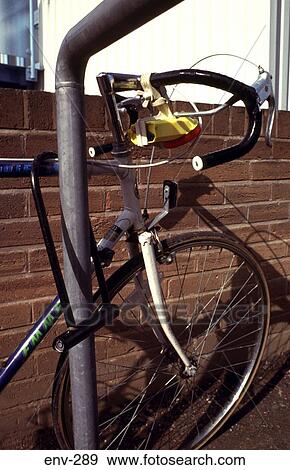 Bicycle Locked to Railing View Large Photo Image Stock Photo - Bicycle Locked to Railing. Fotosearch