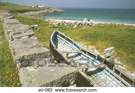 Blue Boat by Stone Wall at the Coast View Large Photo Image Stock Image - Blue Boat by Stone Wall at the Coast. Fotosearch