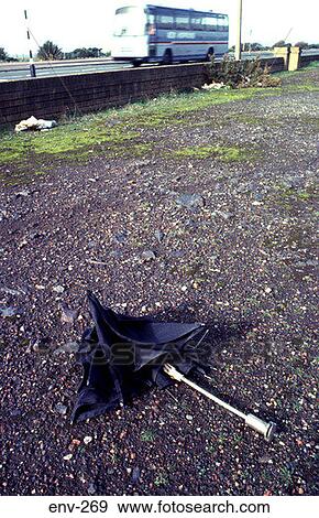 Broken Black Umbrella on Ground View Large Photo Image Stock Photo - Broken Black Umbrella on Ground. Fotosearch