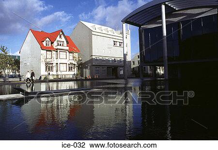 Stock Image - Buildings on a Flooded Street Reykjavik Iceland. Fotosearch