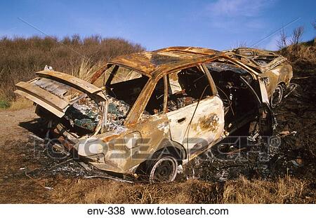 Stock Photo - Burnt Out and Rusted Car. Fotosearch