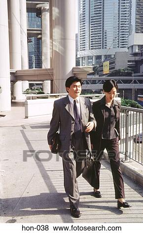 Businessman and Woman Hong Kong China View Large Photo Image Stock Photo - Businessman and Woman Hong Kong China. Fotosearch