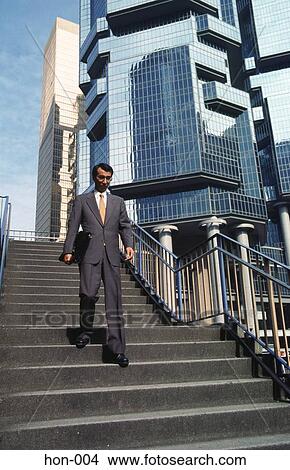 Picture - Businessman on Staircase Hong Kong. Fotosearch