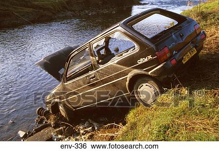 Car Dumped in River View Large Photo Image Stock Photograph - Car Dumped in River. Fotosearch