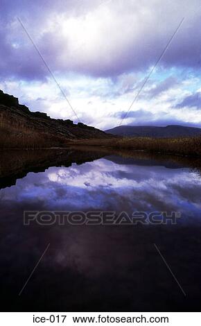 Clouds Reflected in a Mountain River Iceland View Large Photo Image Stock Photo - Clouds Reflected in a Mountain River Iceland. Fotosearch