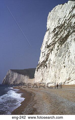 Couple Walking on Beach Beneath Chalk Cliffs England View Large Photo Image Stock Image - Couple Walking on Beach Beneath Chalk Cliffs England. Fotosearch
