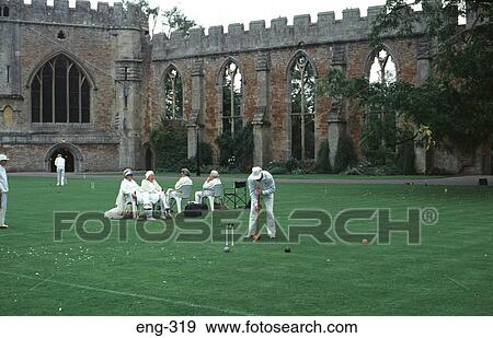 Stock Photo - Croquet Players in 14th Century Bishops Palace. Fotosearch