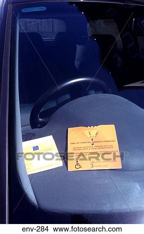 Disabled Parking Permit in Car Windscreen View Large Photo Image Picture - Disabled Parking Permit in Car Windscreen. Fotosearch