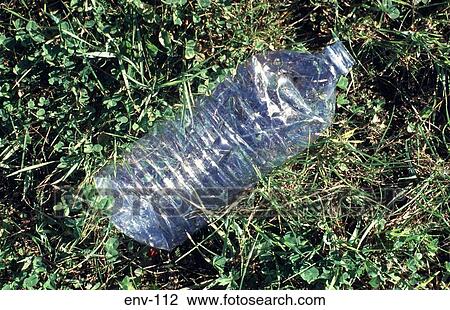Empty Water Bottle Littering Grass View Large Photo Image Stock Image - Empty Water Bottle Littering Grass. Fotosearch