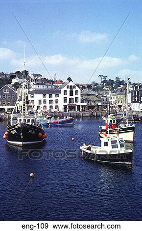 Fishing Boats in Mevagissey Harbour England UK View Large Photo Image Stock Photo - Fishing Boats in Mevagissey Harbour England UK. Fotosearch