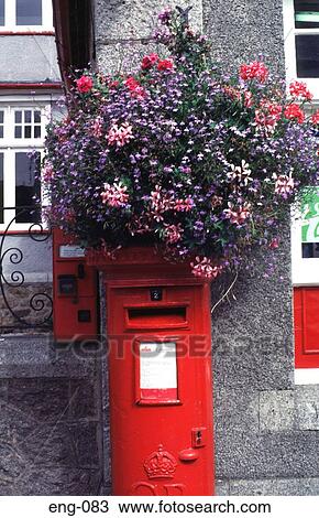 Flowers on Red Post Box England UK View Large Photo Image Stock Image - Flowers on Red Post Box England UK. Fotosearch
