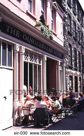 Group Of People Seated Outside Public House Cork View Large Photo Image Stock Image - Group Of People Seated Outside Public House Cork. Fotosearch