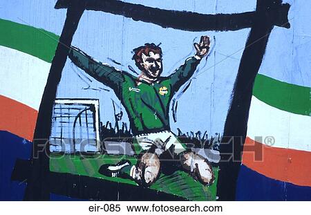 Stock Photography - Irish Footballer with Flag Painted on Wall. Fotosearch