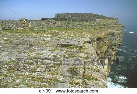 Man and Woman by Prehistoric Fort on Clifftop View Large Photo Image Stock Image - Man and Woman by Prehistoric Fort on Clifftop. Fotosearch