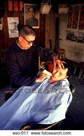 Stock Photo - Man Being Shaved in Barber's Shop China. Fotosearch