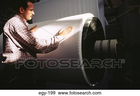 Man Checking Roll of Cotton Cloth Egypt View Large Photo Image Stock Photo - Man Checking Roll of Cotton Cloth Egypt. Fotosearch