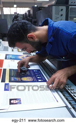 Man Examining Prints with Loupe Egypt View Large Photo Image Stock Image - Man Examining Prints with Loupe Egypt. Fotosearch