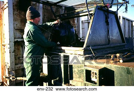 Man Putting Rubbish Sack in Skip View Large Photo Image Stock Image - Man Putting Rubbish Sack in Skip. Fotosearch
