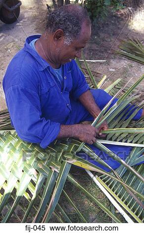 Man Weaving Palm Leaves Fiji View Large Photo Image Stock Photography - Man Weaving Palm Leaves Fiji. Fotosearch