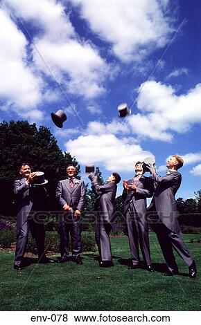 Men in Wedding Photograph Throwing Hats Wales View Large Photo Image Stock Photo - Men in Wedding Photograph Throwing Hats Wales. Fotosearch