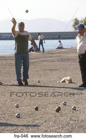 Men Playing Boules View Large Photo Image Stock Photograph - Men Playing Boules. Fotosearch