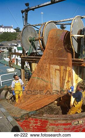 Men Unloading Fishing Nets from Trawler Ireland View Large Photo Image Stock Image - Men Unloading Fishing Nets from Trawler Ireland. Fotosearch