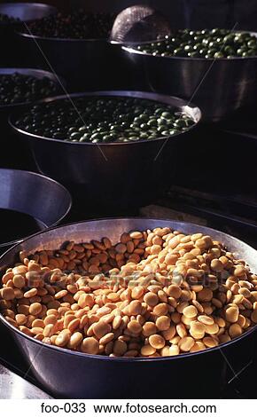 Stock Image - Metal Bowls of Yellow Butter Beans. Fotosearch