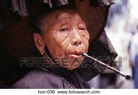 Old Woman in Traditional Clothing Smoking Pipe Hong View Large Photo Image Stock Photograph - Old Woman in Traditional Clothing Smoking Pipe Hong. Fotosearch