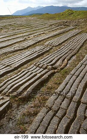 Peat Cutting in the Murmturk Mountains Ireland View Large Photo Image Stock Photo - Peat Cutting in the Murmturk Mountains Ireland. Fotosearch