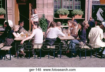 People Drinking Beer outside Bar Frankfurt Germany View Large Photo Image Stock Photography - People Drinking Beer outside Bar Frankfurt Germany. Fotosearch