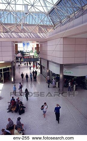 People Walking through Modern Shopping Mall UK View Large Photo Image Stock Photography - People Walking through Modern Shopping Mall UK. Fotosearch