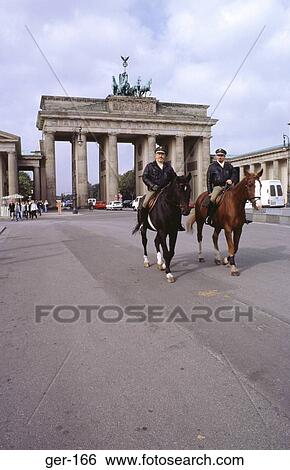 Policemen on Horseback by Brandenburg Gate Berlin View Large Photo Image Stock Photograph - Policemen on Horseback by Brandenburg Gate Berlin. Fotosearch