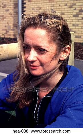 Portrait of Blonde Woman Wearing Sporty Clothes View Large Photo Image Stock Photo - Portrait of Blonde Woman Wearing Sporty Clothes. Fotosearch
