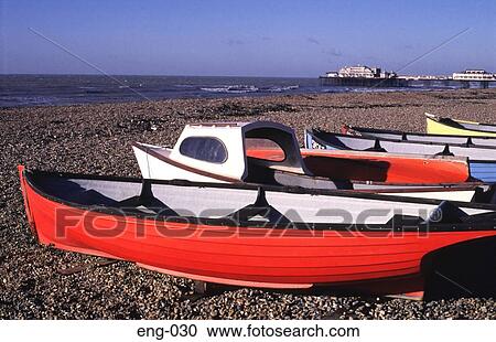 Red Boat on Brighton Beach England UK View Large Photo Image Stock Image - Red Boat on Brighton Beach England UK. Fotosearch