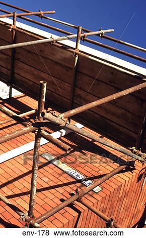 Rusty Scaffolding on a Brick House View Large Photo Image Stock Photo - Rusty Scaffolding on a Brick House. Fotosearch
