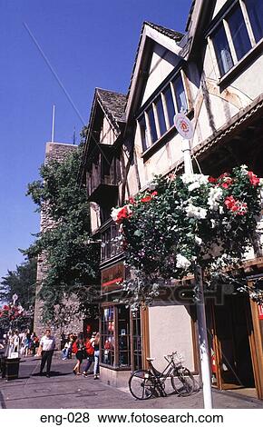 Shopfronts and Hanging Baskets Oxford England UK View Large Photo Image Stock Photo - Shopfronts and Hanging Baskets Oxford England UK. Fotosearch