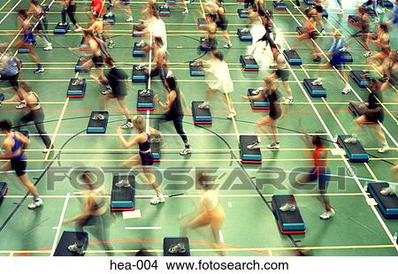 Picture - Side View of Large Step Aerobics Class. Fotosearch