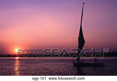 Silhouette of Felucca Boat against Sunset Egypt View Large Photo Image Stock Image - Silhouette of Felucca Boat against Sunset Egypt. Fotosearch