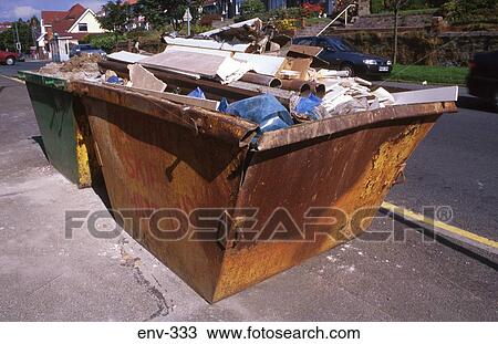Stock Image - Skip Filled With Rubbish. Fotosearch