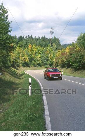 Small Car on Country Road Schwarzwald Germany View Large Photo Image Stock Image - Small Car on Country Road Schwarzwald Germany. Fotosearch