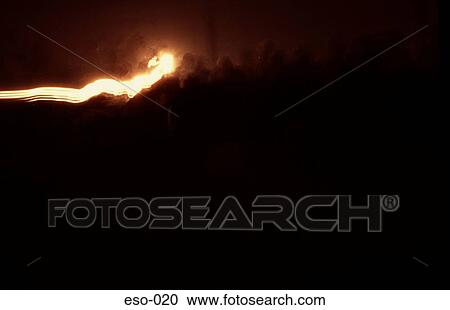 Streak of Bright Light against Dark Background View Large Photo Image Stock Image - Streak of Bright Light against Dark Background. Fotosearch